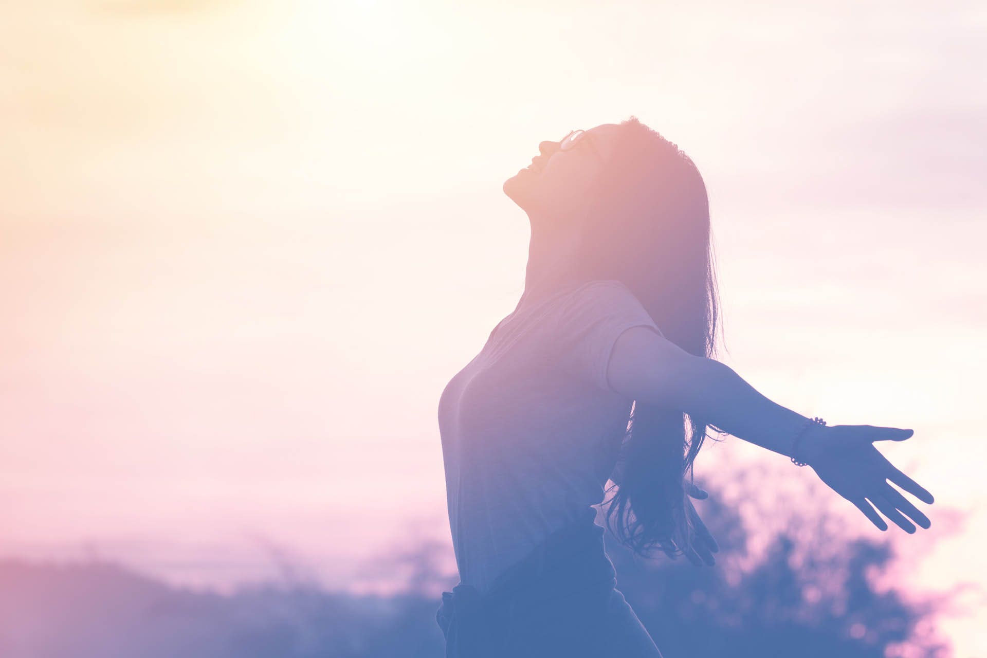 happy person standing out in the sunlight on a morning (image)